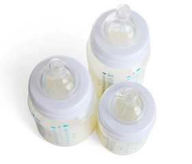 Fototapeta na wymiar Baby milk bottles, isolated on white