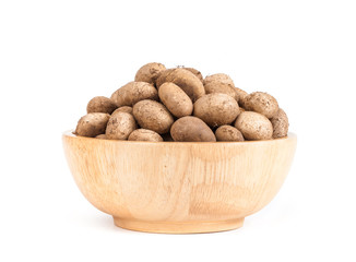 puffball mushroom in wooden bowl isolated on white background