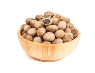 puffball mushroom in wooden bowl isolated on white background