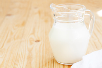 Obraz na płótnie Canvas Glass jug with milk