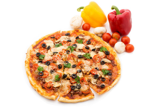 Pizza with ham, pepper and olives