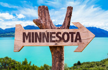 Minnesota wooden sign with landscape background
