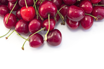Fresh Ripe Cherries Isolated on White