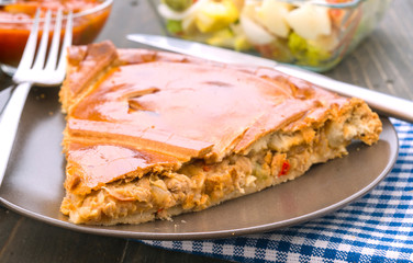 chunk of pie stuffed with tuna
