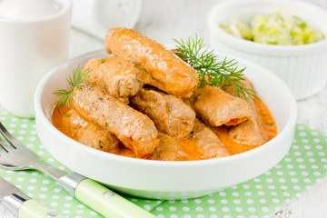 Meat finger roll in sauce