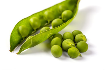 fresh green peas isolated on a white background..