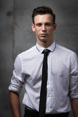 young business man style, fashion the financial sector, piercing glance confident,