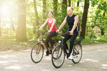 Young Couple Riding Bicycles