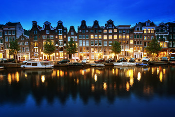 Fototapeta na wymiar Canal in Amsterdam at night, Netherlands