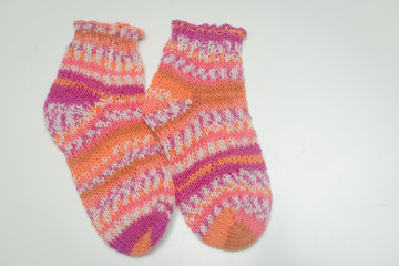 Closeup on knitted socks on light background 