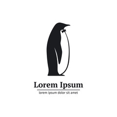 Logo penguin black and white standing in profile © ianakauri