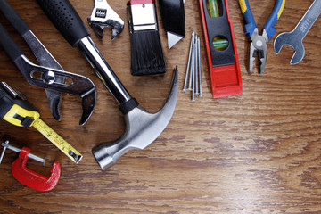 Assorted work tools on wood