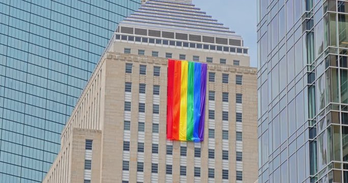 Rainbow pride flag hanging on John Hancock Tower