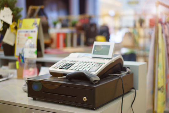 One cash register with a bar code reader