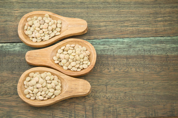 Lentil beans on wooden background