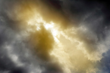 Spotlight against dark sky