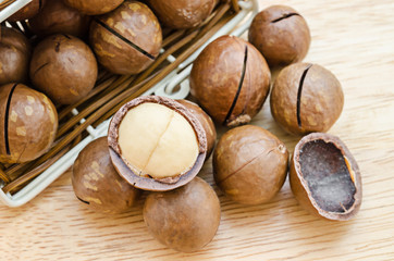 Macadamia nut on wooden.
