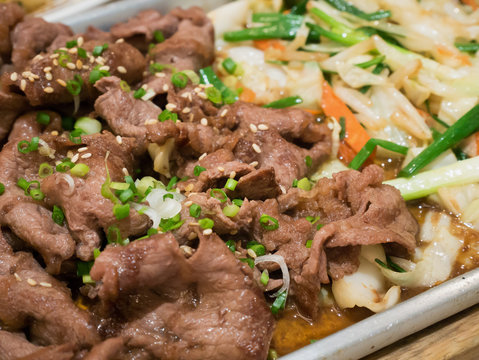 Beef with vegetables on hot plate