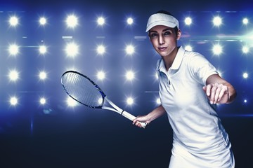 Fototapeta na wymiar Composite image of female athlete playing tennis