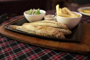 Roast smelt on a plate