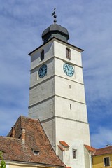 Fototapeta na wymiar Medieval clock tower with bell in Europe - Council Tower 