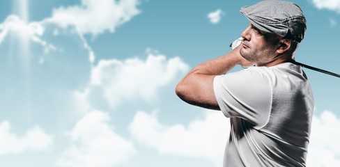 Composite image of portrait of golf player taking a shot © vectorfusionart