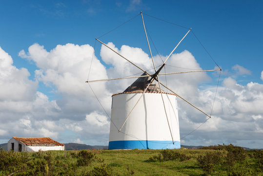 Traditional portuguese windmill near Odeceixe Aljezur in springtime, Algarve, Portugal