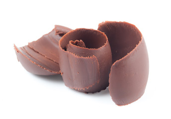 Chocolate shavings on white background