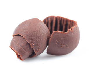 Chocolate shavings on white background