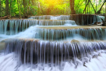 Fototapeten Landscape photo, Huay Mae Kamin Waterfall, beautiful waterfall in rainforest at Kanchanaburi province, Thailand © cakeio