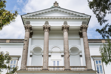 Pillars on front facade of manor house in Topolcianky .