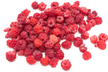 Ripe raspberry on a white background