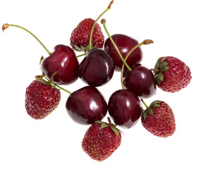 strawberry with red cherries on a white background