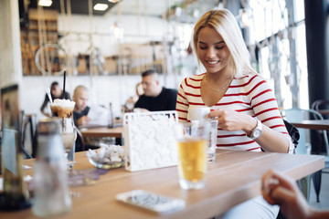 Beautiful woman enjoying beverages
