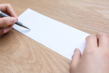 Obraz premium businessman writing on white paper