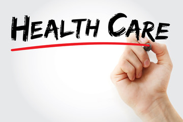Hand writing Health care with marker, health concept