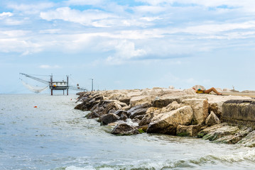 fishermen and fishing shack on the pier