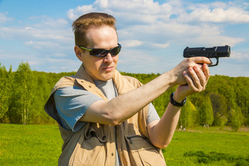 The man shooting from the sports gun