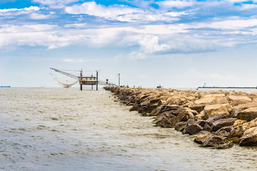 fishermen and fishing shack on the pier