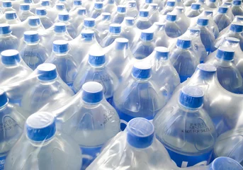 Fotobehang Mineral water bottles - plastic bottles © showcake