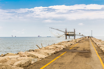fishermen and fishing shack on the pier