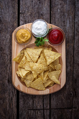 Mexican corn chips nachos with sauce