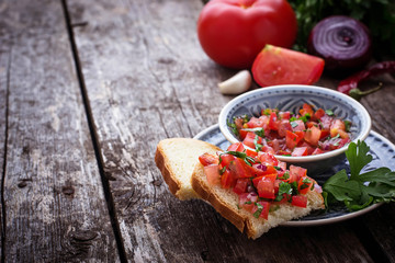 Mexican  tomato salsa sauce  and toasts