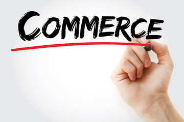 Hand writing COMMERCE with marker, business concept