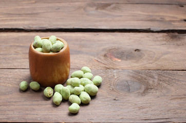 green nut on wood