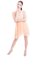 Beautiful lady posing full body in summer dress and heels