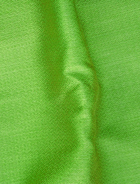 Green fabric silk background with curve.