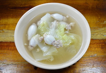 boiled minced pork stuffed squid with Chinese cabbage hot soup in bowl