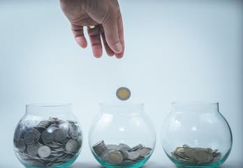 Money in a hand, saving,  money box