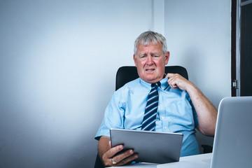 Business man stressed and under pressure, selective focus